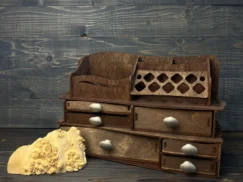  A close-up view of one of the metal handles of the organizer, highlighting its design and quality.