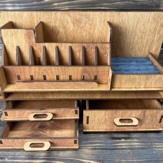 An image of the open "Cleopatra" organizer, showing the internal compartments.