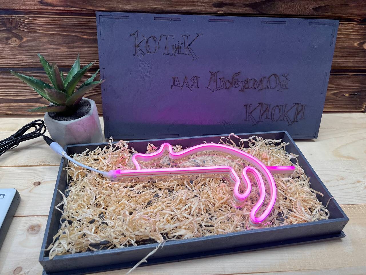 A close-up shot of the nightlight illuminating a laptop keyboard from an over-the-shoulder perspective.