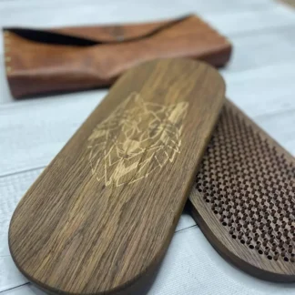 A person's feet on the sadhu board during a meditation practice.