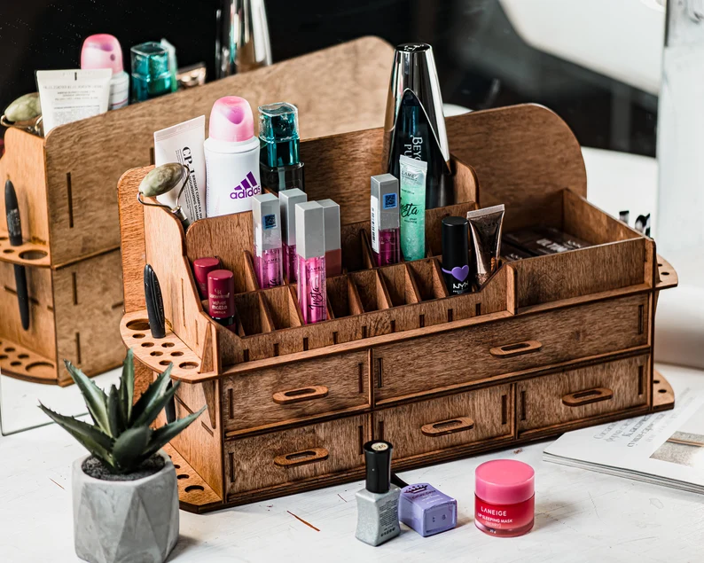 A photo of the organizer on a clean, light-colored vanity, with a mirror and other decor items in the background.