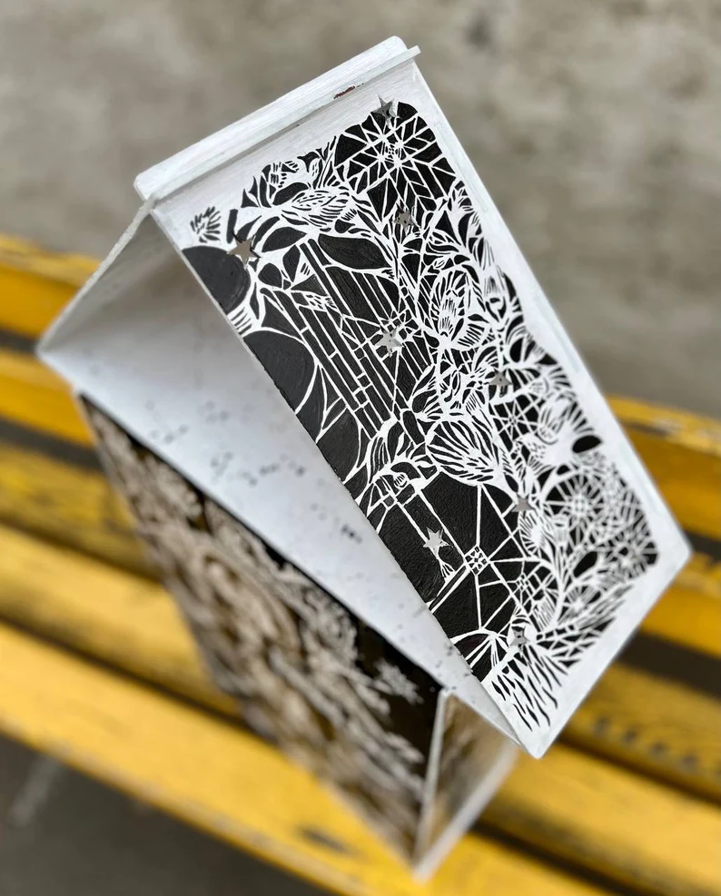 A shot where a hand is reaching for a pen from the organizer.