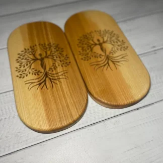 A top-down view of the sadhu board, showing the arrangement of the galvanized nails on the natural wood.