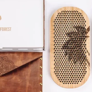 A flat lay image of the sadhu board on a light background.