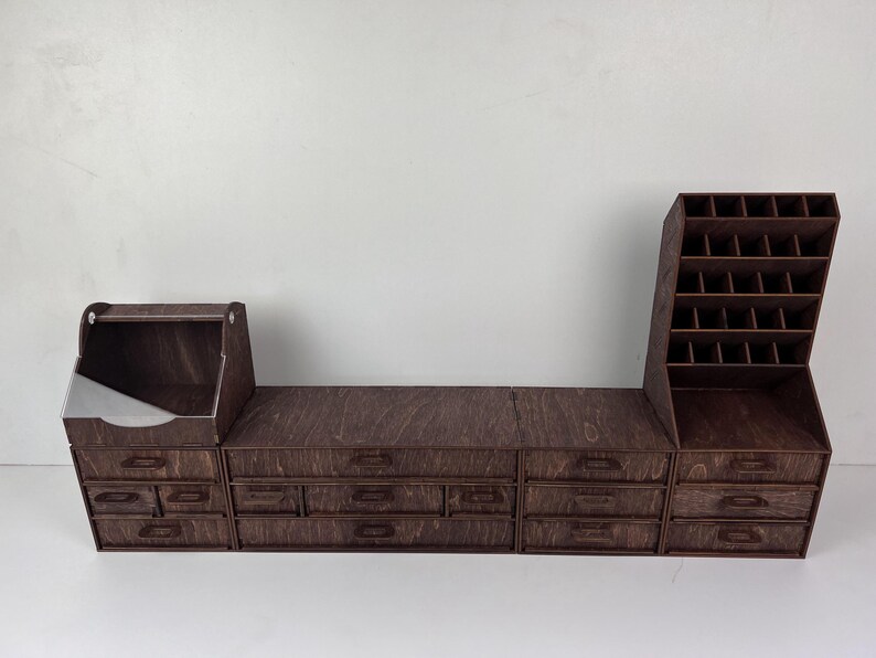 A lifestyle shot of the organizer on a vanity, filled with a diverse collection of makeup products.