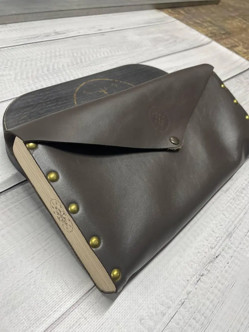 The sadhu board placed in a serene meditation space with a yoga mat and a plant.