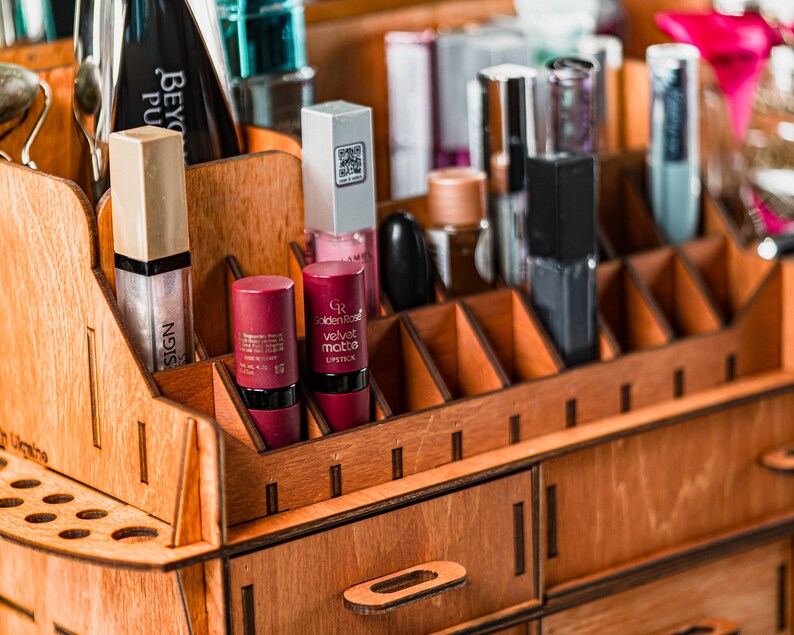 A top-down view of the organizer, showcasing its full layout and the thoughtful arrangement of cosmetics within.