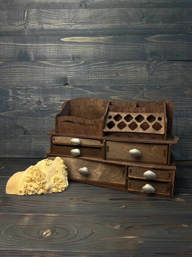 A close-up view of one of the metal handles of the organizer, highlighting its design and quality.