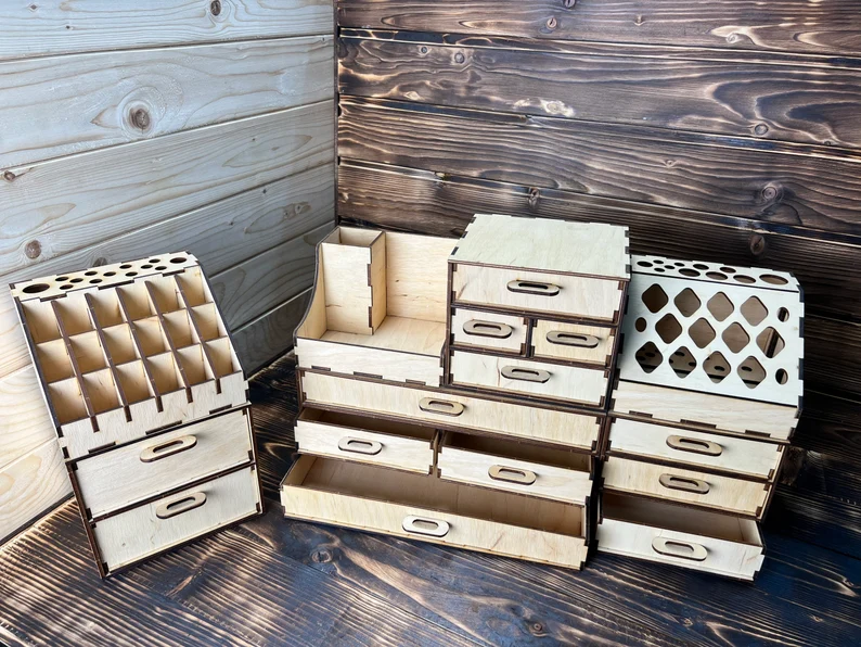 A close-up shot of a hand moving one of the modular compartments to a new position.