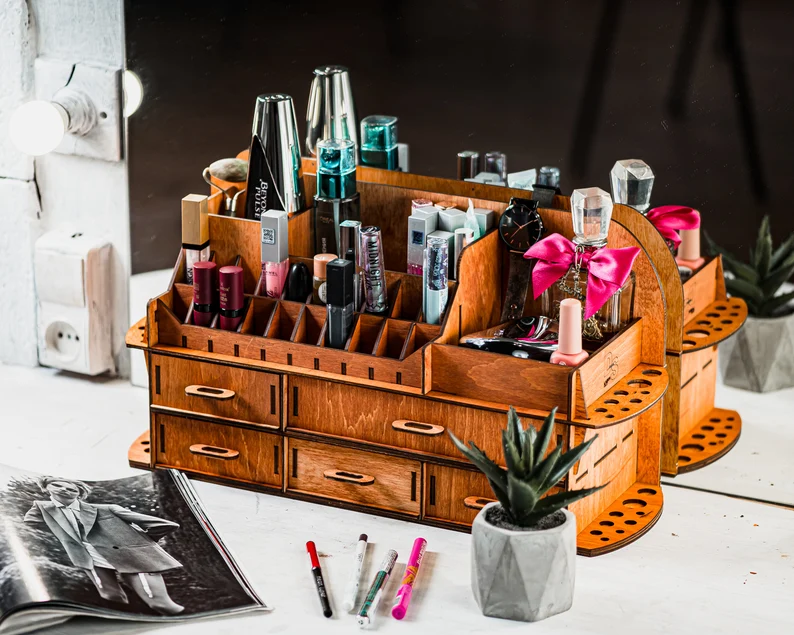 A top-down view of the organizer, demonstrating its full layout and the thoughtful arrangement of cosmetics inside.