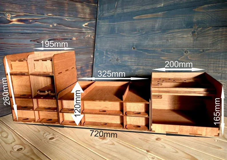 A close-up shot of a single compartment of the organizer, highlighting the fine wood grain and the smooth finish.