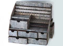 A flat lay image of the organizer with a few key beauty products laid out around it.