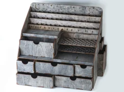 A flat lay image of the organizer with a few key beauty products laid out around it.