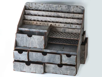 A flat lay image of the organizer with a few key beauty products laid out around it.