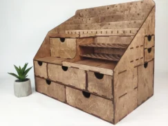 A top-down view of the organizer showing its numerous compartments filled with a variety of beauty products.