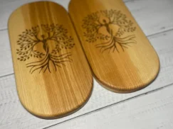 A top-down view of the sadhu board, showing the arrangement of the galvanized nails on the natural wood.