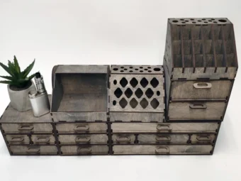 A close-up on a single compartment of the organizer, filled with lipstick and small beauty items.